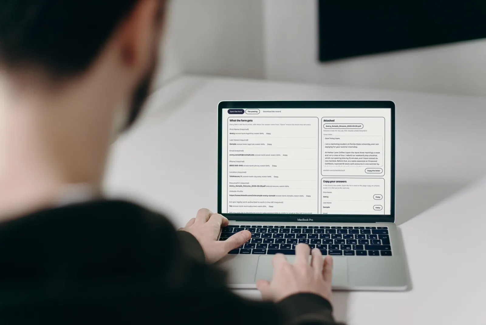 A man types on a laptop at a white desk, the Coffee To Career apply page on screen with sample data.